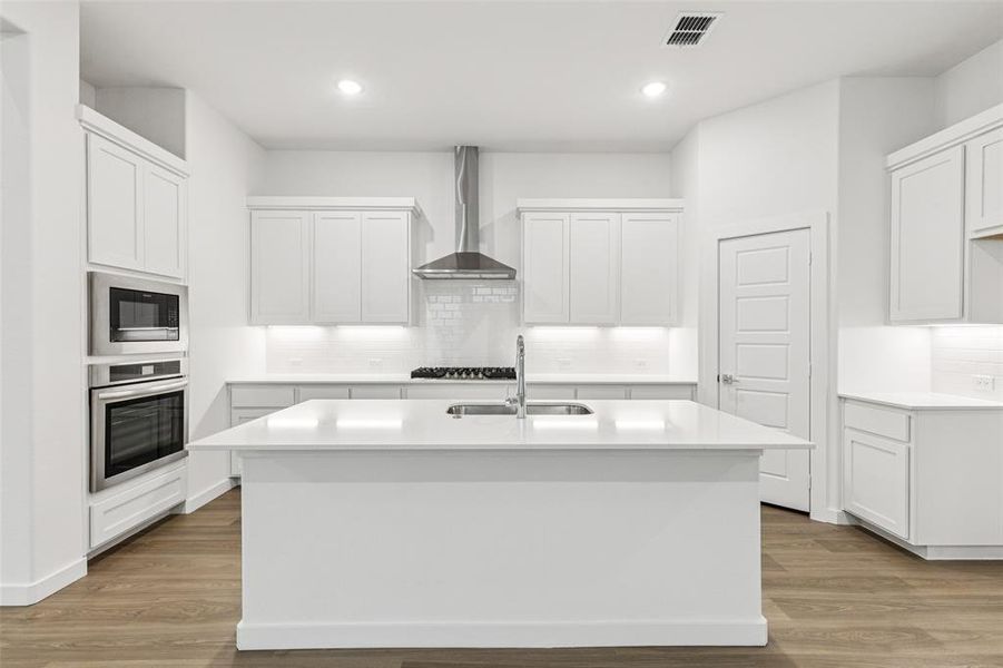 Kitchen in the Picasso II home plan by Trophy Signature Homes – REPRESENTATIVE PHOTO Kitchen in the Picasso II home plan by Trophy Signature Homes – REPRESENTATIVE PHOTO