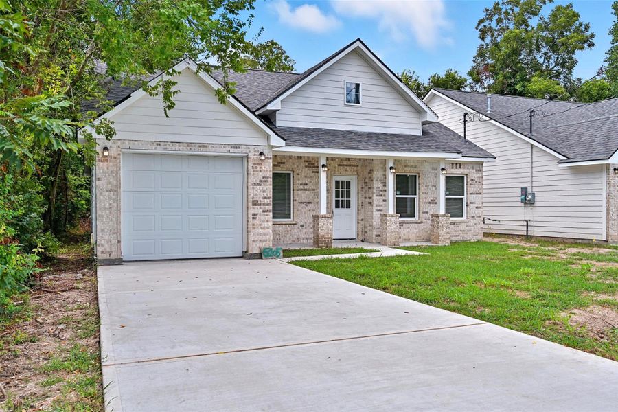 Front exterior of a new home in , Texas City, TX, highlighting curb appeal (Image 2). Front exterior of a new home in , Texas City, TX, highlighting curb appeal (Image 2).