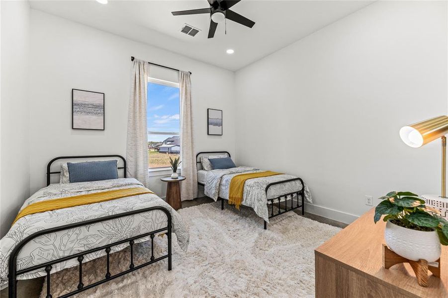 Bedroom with recessed lighting and a ceiling fan Bedroom with recessed lighting and a ceiling fan