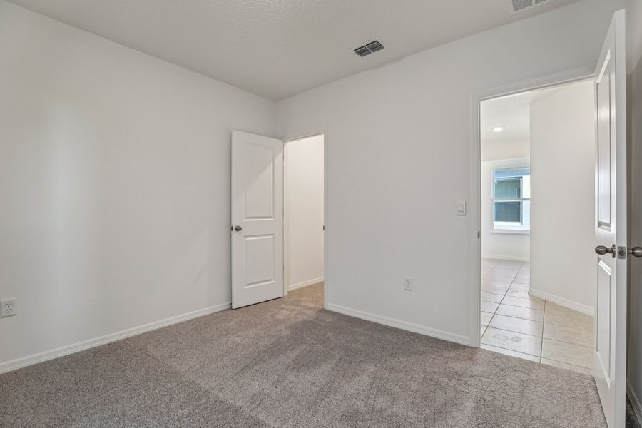 Representative unfurnished interior of a home built from the Vista by Maronda Homes in Heritage Station, Punta Gorda (Image 26).