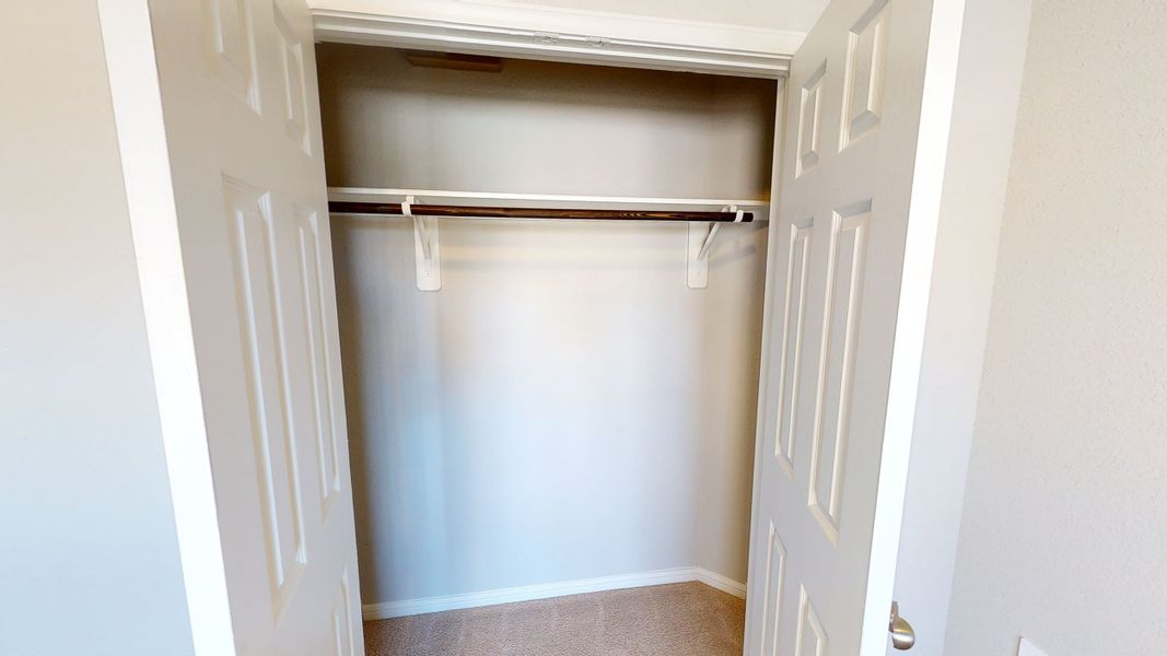 Representative unfurnished interior of a home built from the Floor Plan 1500 by Colina Homes in Cypress Green, Hockley (Image 25).