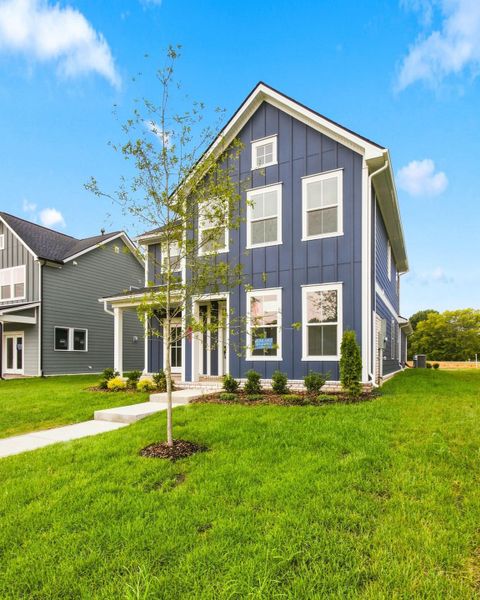 Front exterior of a new home in Heritage Green – The Porch Collection, Columbia, TN, highlighting curb appeal (Image 15).