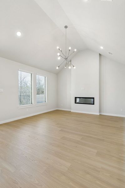 Living Room in the Masters home plan by Trophy Signature Homes – REPRESENTATIVE PHOTO