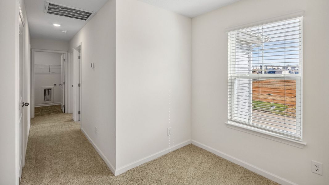 Representative unfurnished interior of a home built from the Bennet by D.R. Horton in The Hideaway at Fox Meadows, Bluff City (Image 15).