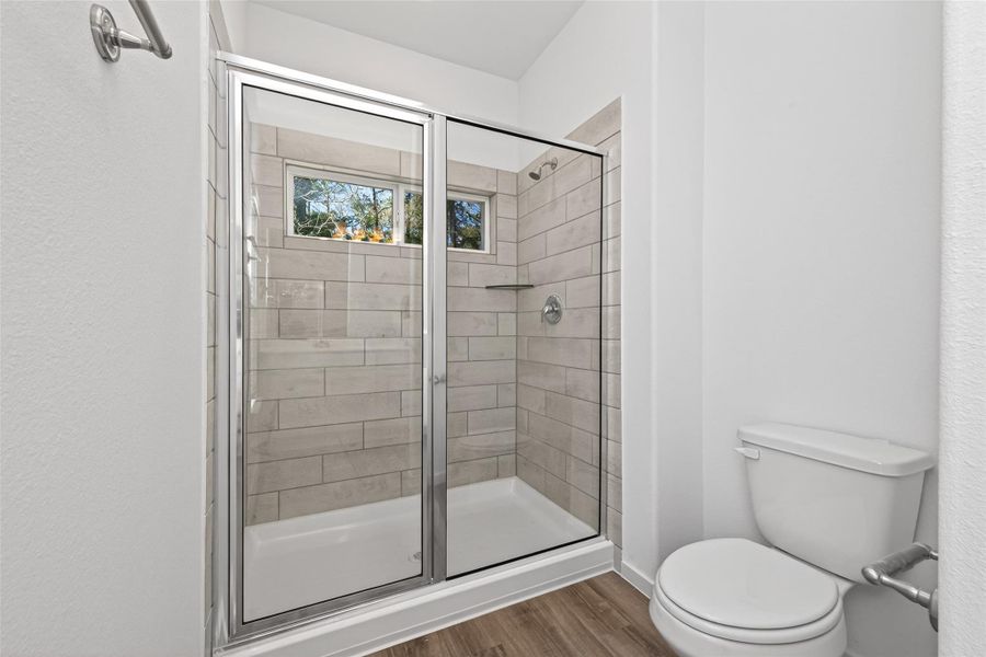 Furnished interior view inside a new home in Enclave at Willis, Willis (Image 9).