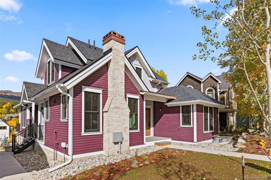 Front exterior of a new home in , Breckenridge, CO, highlighting curb appeal (Image 1). Front exterior of a new home in , Breckenridge, CO, highlighting curb appeal (Image 1).
