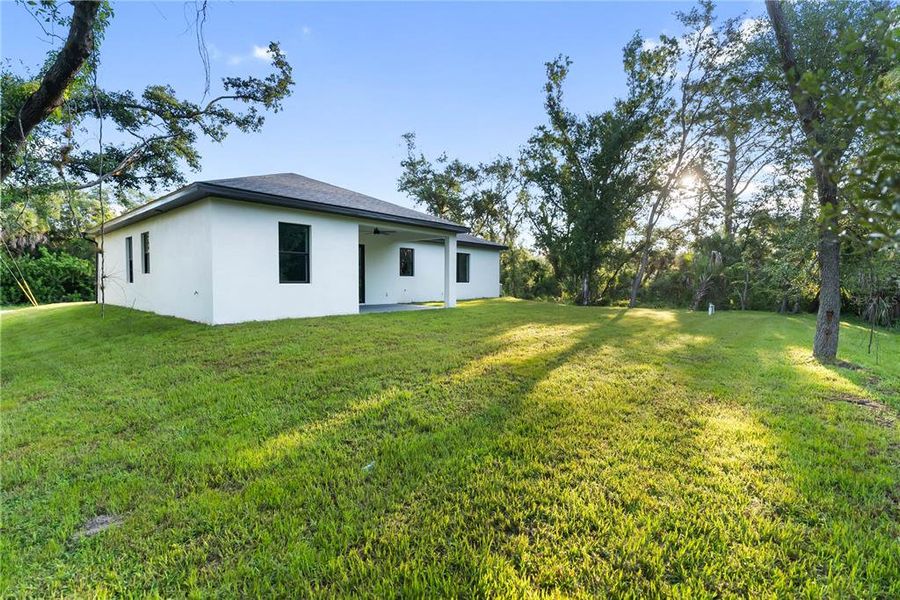Exterior details and patio area of a home in , Port Charlotte (Image 38).
