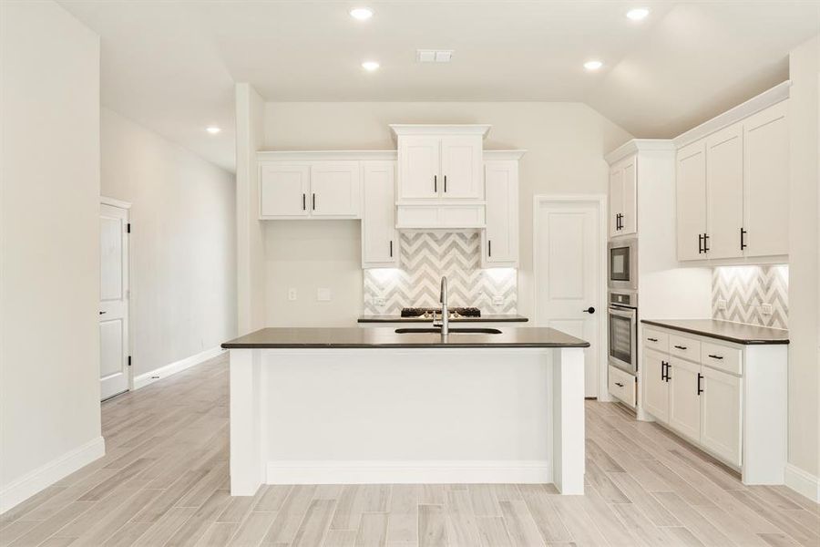 Furnished interior view inside a new home in Devonshire Classic 50-55, Forney (Image 17). Furnished interior view inside a new home in Devonshire Classic 50-55, Forney (Image 17).