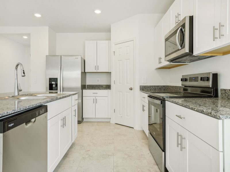 Kitchen in the Daphne floorplan at 2326 White Tail Street