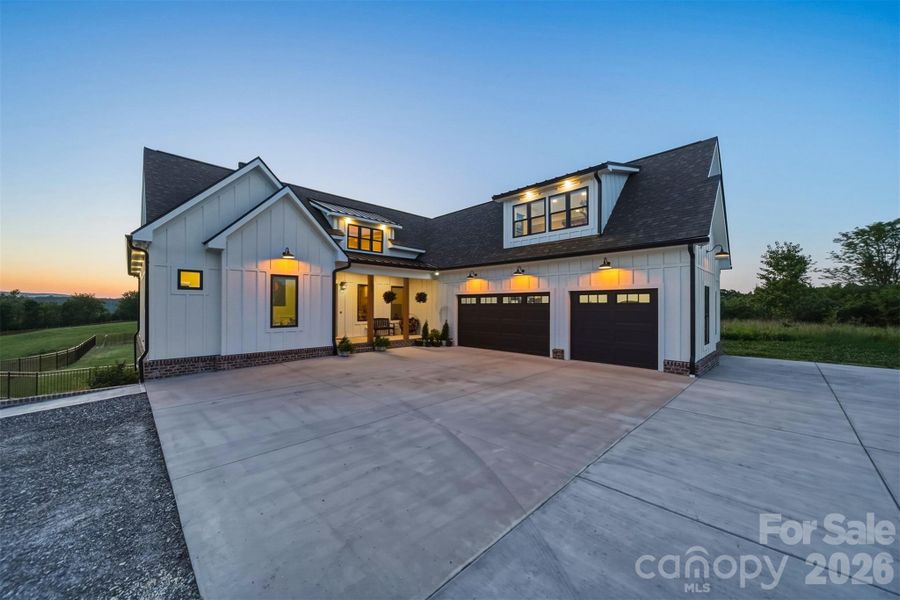 Front exterior of a new home in , Hickory, NC, highlighting curb appeal (Image 20).