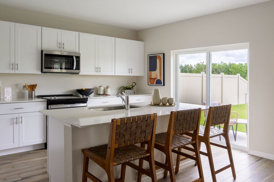 Representative furnished interior of a home built from the Indigo by Casa Fresca Homes in Crosswinds, Haines City (Image 6).