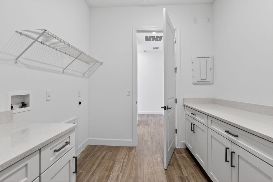 Furnished interior view inside a new home in Center Lake Ranch Community Group Page, St. Cloud (Image 13).