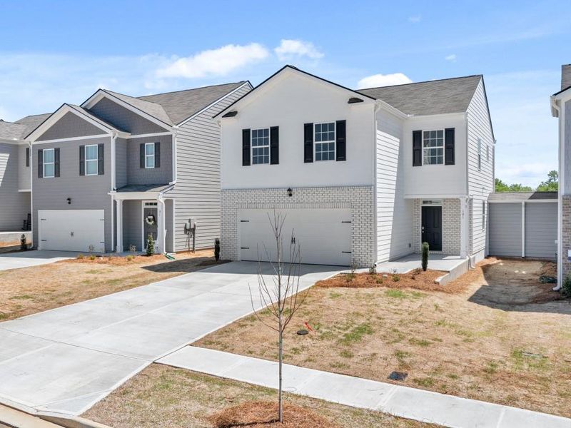 Front exterior of a new home in Rolling Meadows, Jasper, GA, highlighting curb appeal (Image 34).
