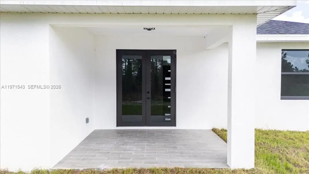 Exterior details and patio area of a home in , Lehigh Acres (Image 4).