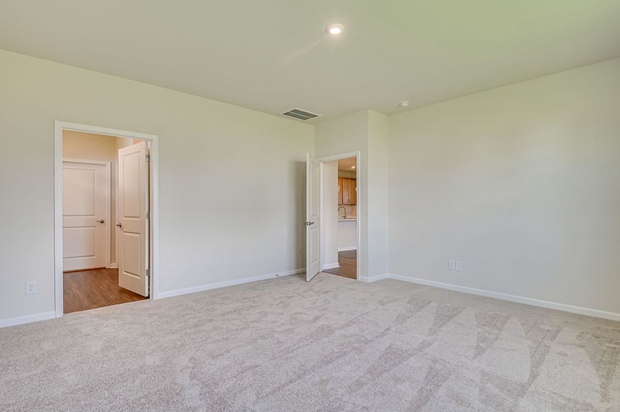 Spacious, unfurnished interior of a new home in The Beacon at Old Peachtree Single Family Homes, Lawrenceville (Image 386).