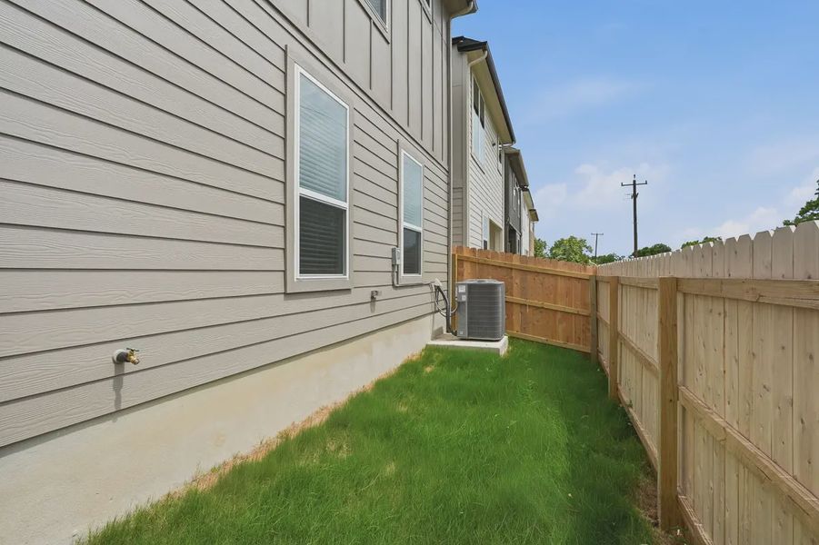 Exterior details and patio area of a home in Rose Hill, San Antonio (Image 24).