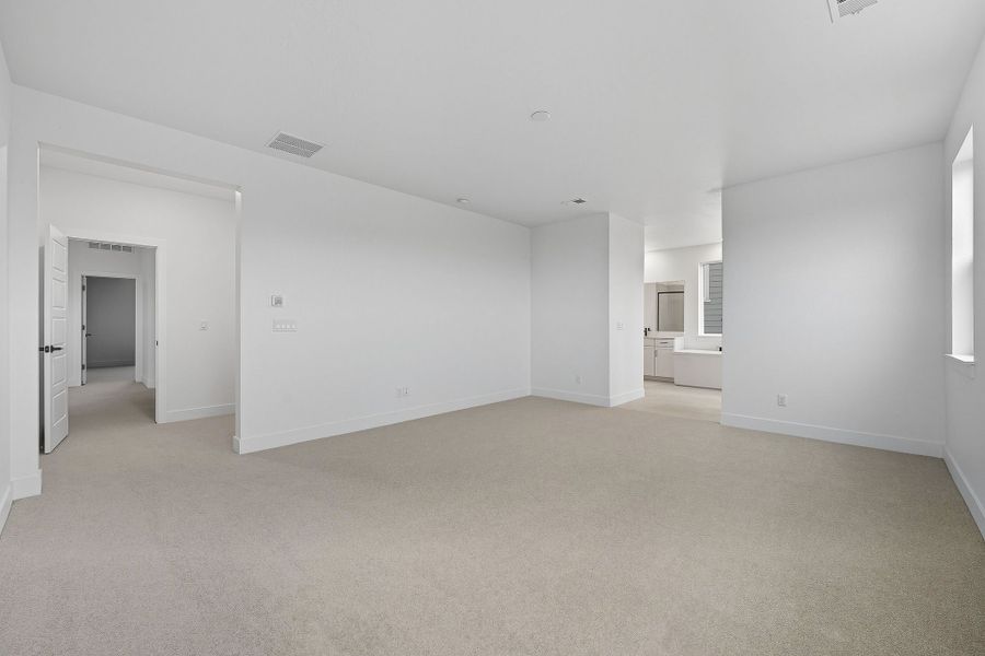 Spacious, unfurnished interior of a new home in Trailstone, Arvada (Image 16).