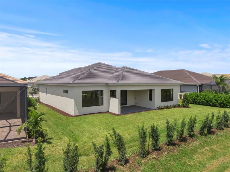 Exterior details and patio area of a home in Cresswind Lakewood Ranch, Lakewood Ranch (Image 25).