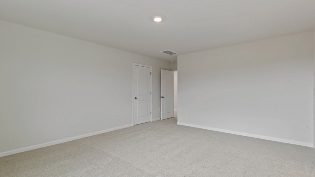 Spacious, unfurnished interior of a new home in The Grove at Matthews Landing, Fuquay Varina (Image 21).
