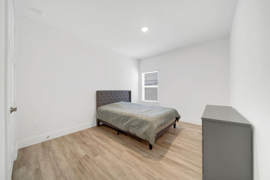 The third secondary bedroom could easily double as a second office or workout room.