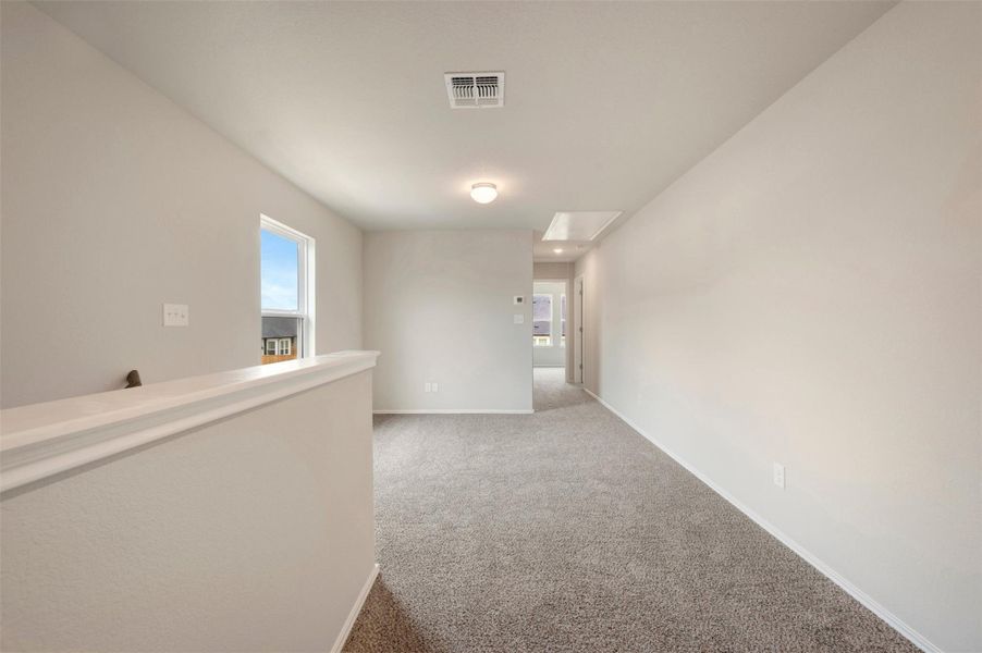 Spacious, unfurnished interior of a new home in Heritage, Dripping Springs (Image 11).