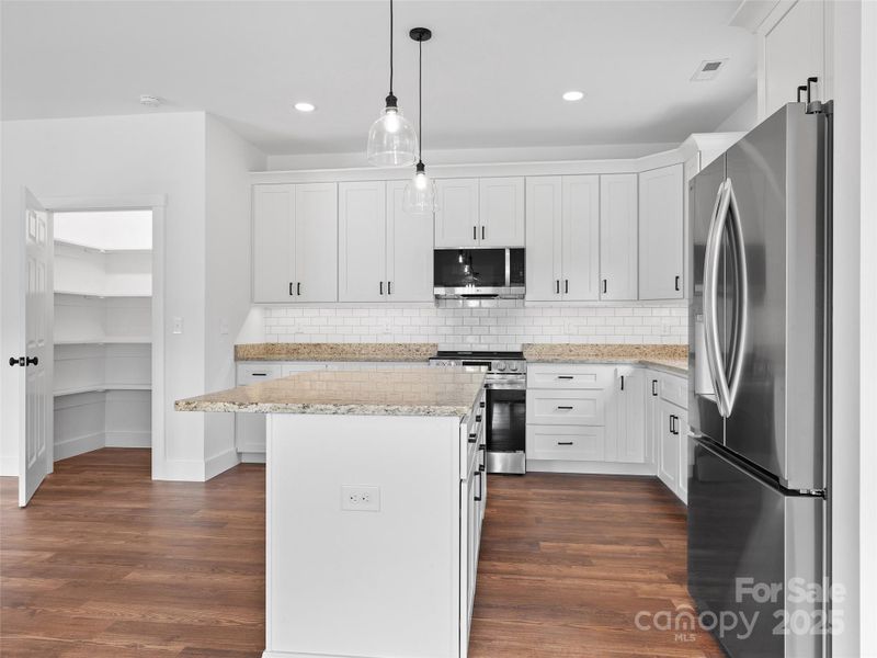 Furnished interior view inside a new home in , Waynesville (Image 8).