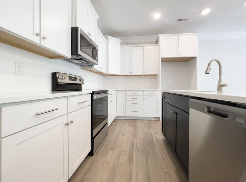 Furnished interior view inside a new home in Fairview Village Townhomes, Simpsonville (Image 9). Furnished interior view inside a new home in Fairview Village Townhomes, Simpsonville (Image 9).
