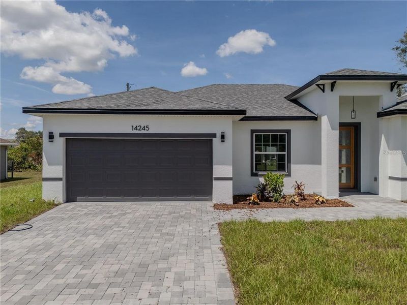 Front exterior of a new home in , Ocala, FL, highlighting curb appeal (Image 33). Front exterior of a new home in , Ocala, FL, highlighting curb appeal (Image 33).