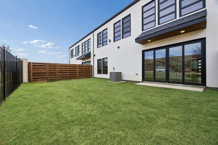 Exterior details and patio area of a home in The Apollo, Wylie (Image 22). Exterior details and patio area of a home in The Apollo, Wylie (Image 22).