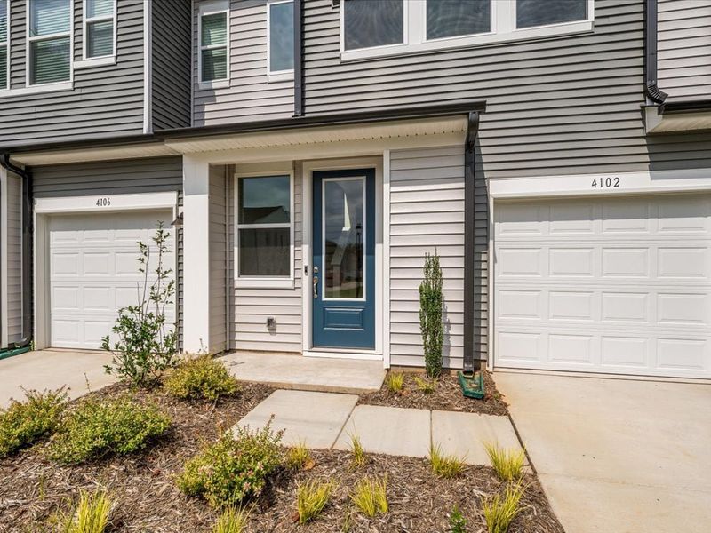 Front exterior of a new home in Fifteen 15 Cannon, Charlotte, NC, highlighting curb appeal (Image 2).