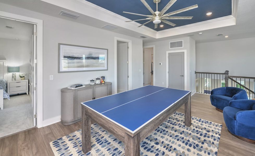 Furnished interior view inside a new home in Laureate Park, Orlando (Image 28).
