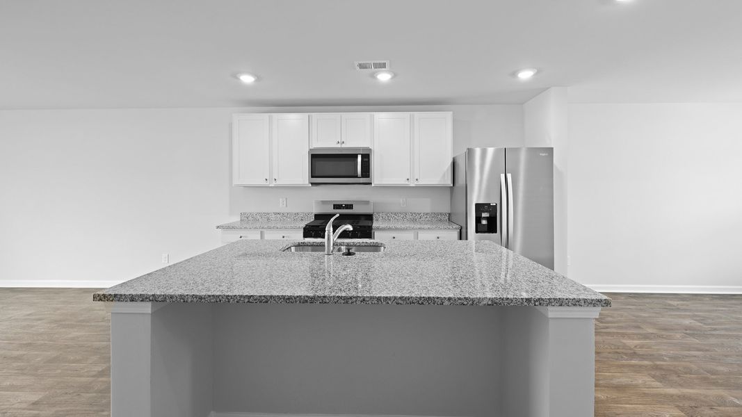 Representative furnished interior of a home built from the MURRAY TH by D.R. Horton in Pine Hills Townhomes at Cane Bay, Summerville (Image 4).