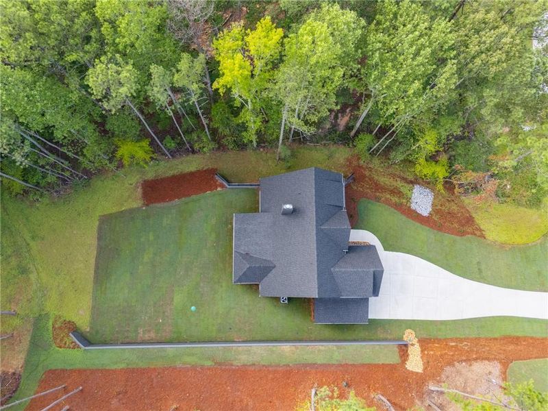 Front exterior of a new home in Liberty Station, Bremen, GA, highlighting curb appeal (Image 27).