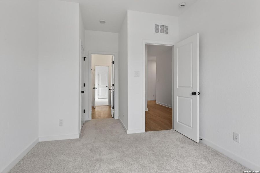 Spacious, unfurnished interior of a new home in Hennersby Hollow, San Antonio (Image 21).