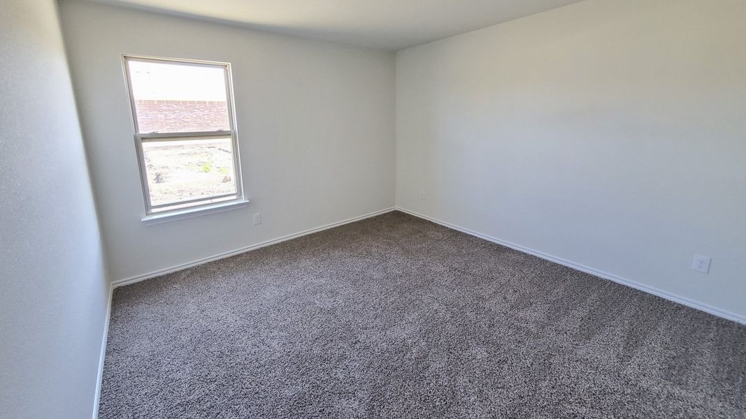Representative unfurnished interior of a home built from the X40S Seabrook by D.R. Horton in Valor Farms, Royse City (Image 9).