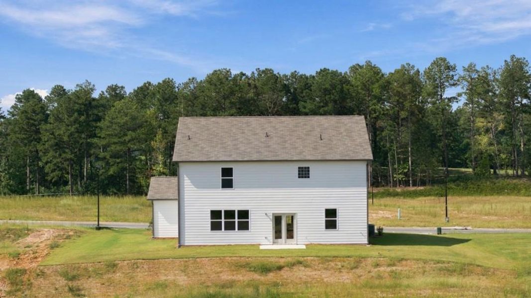 Exterior details and patio area of a home in Fairway 17 at Mirror Lake, Villa Rica (Image 3).