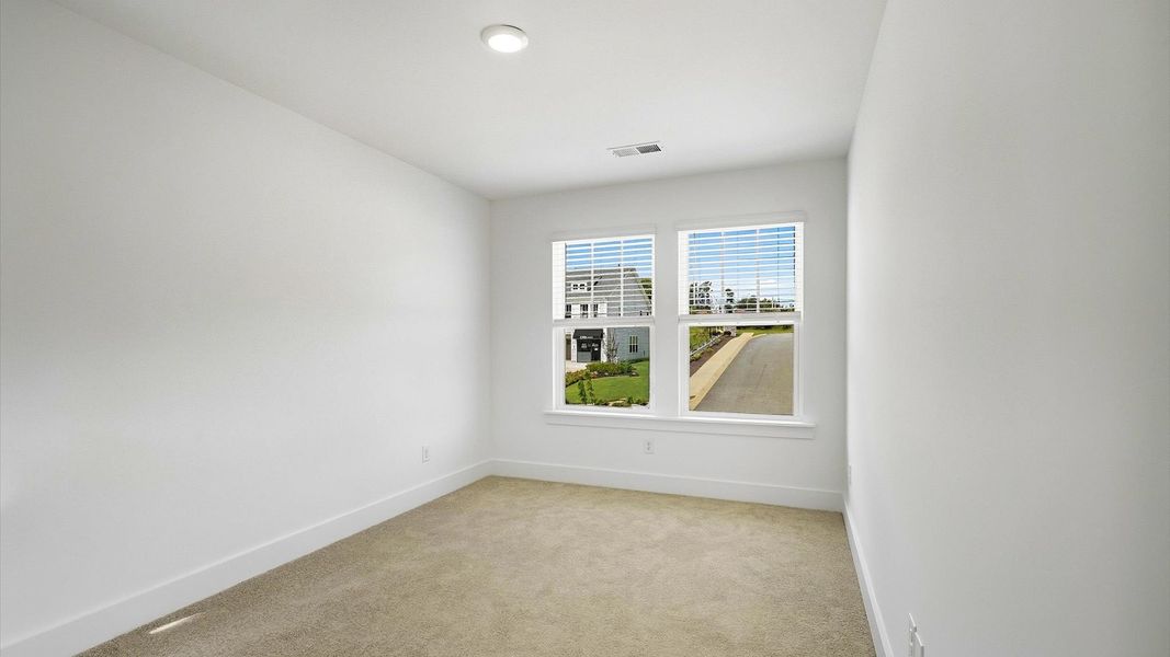 First-rate bedroom with plush carpeting and large windows that provide an open, airy feel at the El Dorado community First-rate bedroom with plush carpeting and large windows that provide an open, airy feel at the El Dorado community