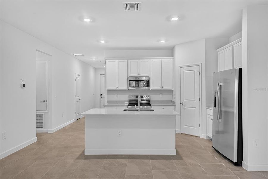 Furnished interior view inside a new home in Lennar at Turnleaf, Punta Gorda (Image 5). Furnished interior view inside a new home in Lennar at Turnleaf, Punta Gorda (Image 5).