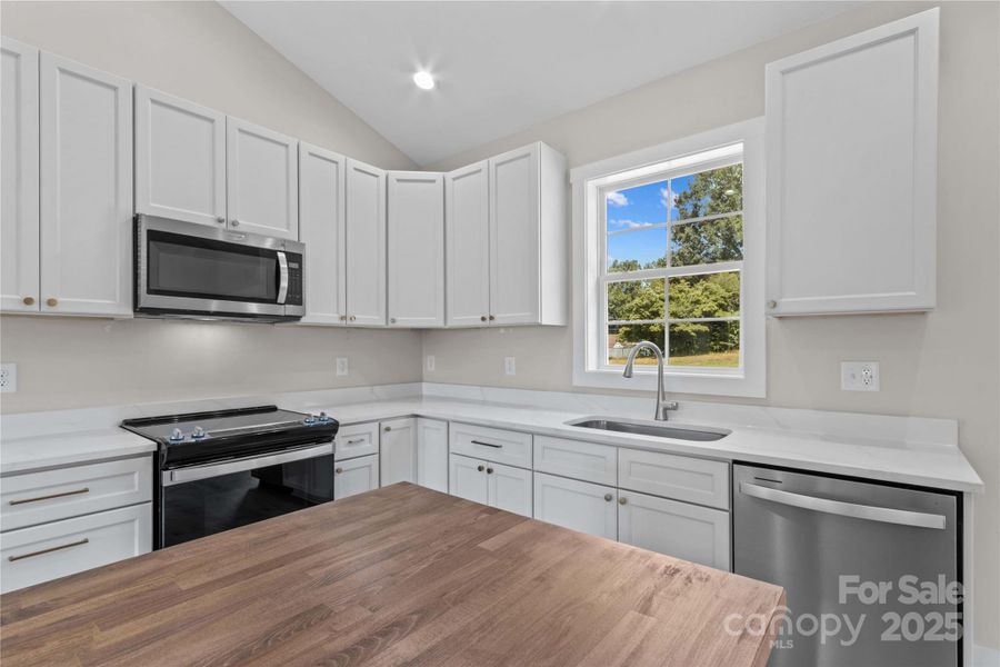 Furnished interior view inside a new home in , Statesville (Image 7).