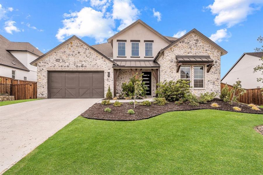 Front exterior of a new home in Sweetgrass, Haslet, TX, highlighting curb appeal (Image 2). Front exterior of a new home in Sweetgrass, Haslet, TX, highlighting curb appeal (Image 2).