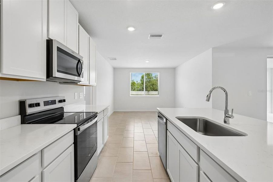 Furnished interior view inside a new home in Pine Ridge Meadows, Hudson (Image 9).