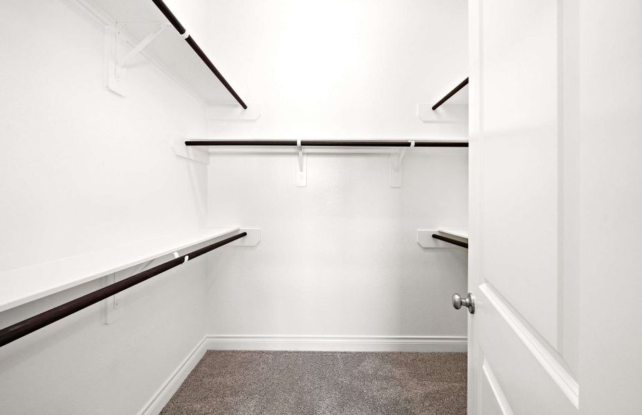 Representative unfurnished interior of a home built from the 2406 by Ravenna Homes in The Highlands 55′, Porter (Image 37).