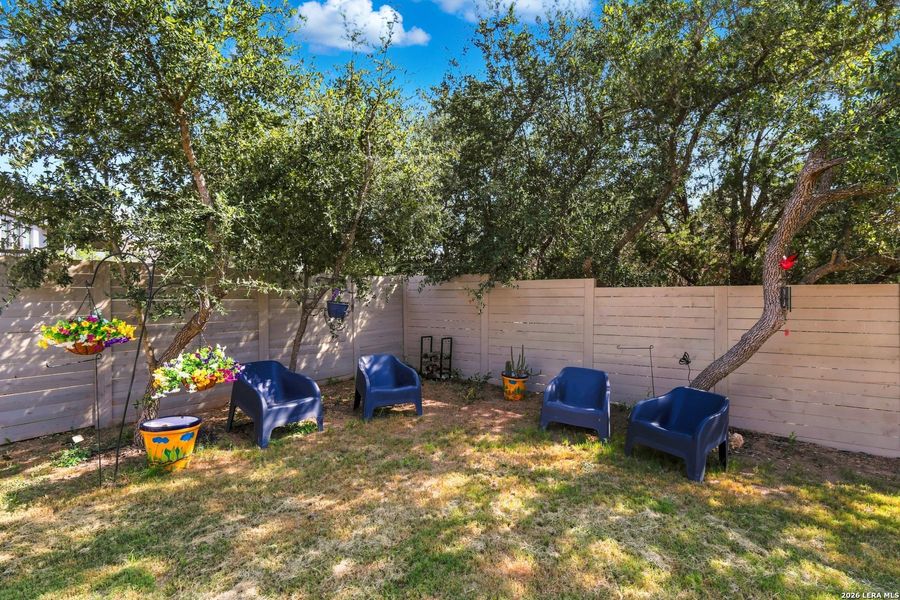 Exterior details and patio area of a home in The Grove at Vintage Oaks, New Braunfels (Image 23).