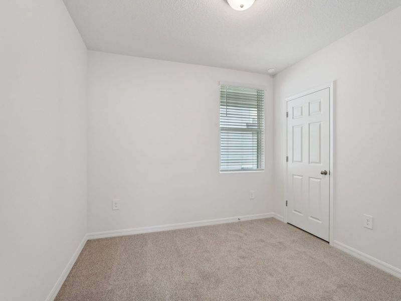 Spacious, unfurnished interior of a new home in Villamar - Classic Series, Winter Haven (Image 8).