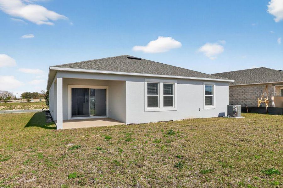 Exterior details and patio area of a home in Waterstone, Groveland (Image 22). Exterior details and patio area of a home in Waterstone, Groveland (Image 22).