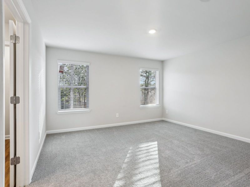 Spacious, unfurnished interior of a new home in Brooks Lake, Loganville (Image 18).