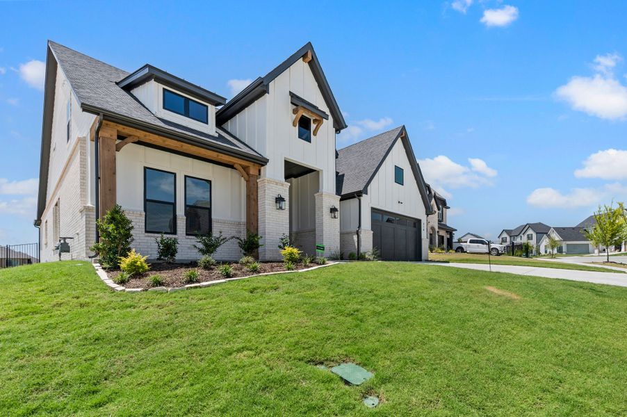 Front exterior of a new home in Parks of Aledo, Aledo, TX, highlighting curb appeal (Image 25).