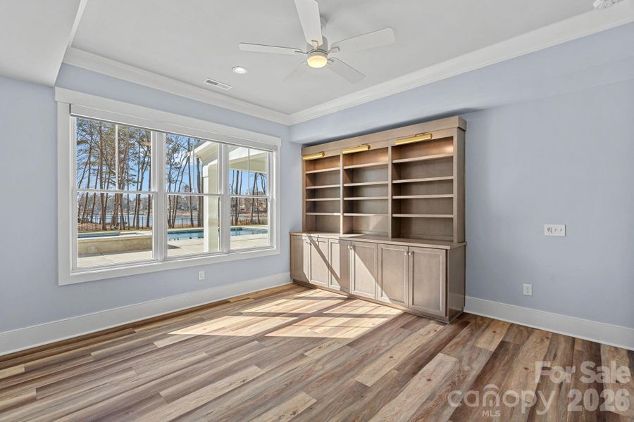 Large covered porch overlooking pool and lake Large covered porch overlooking pool and lake