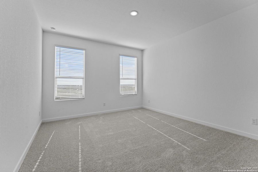 Spacious, unfurnished interior of a new home in Waterwheel: Coastline Collection, San Antonio (Image 27).