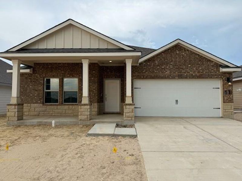 Front exterior of a new home in Southern Pointe, College Station, TX, highlighting curb appeal (Image 1). Front exterior of a new home in Southern Pointe, College Station, TX, highlighting curb appeal (Image 1).